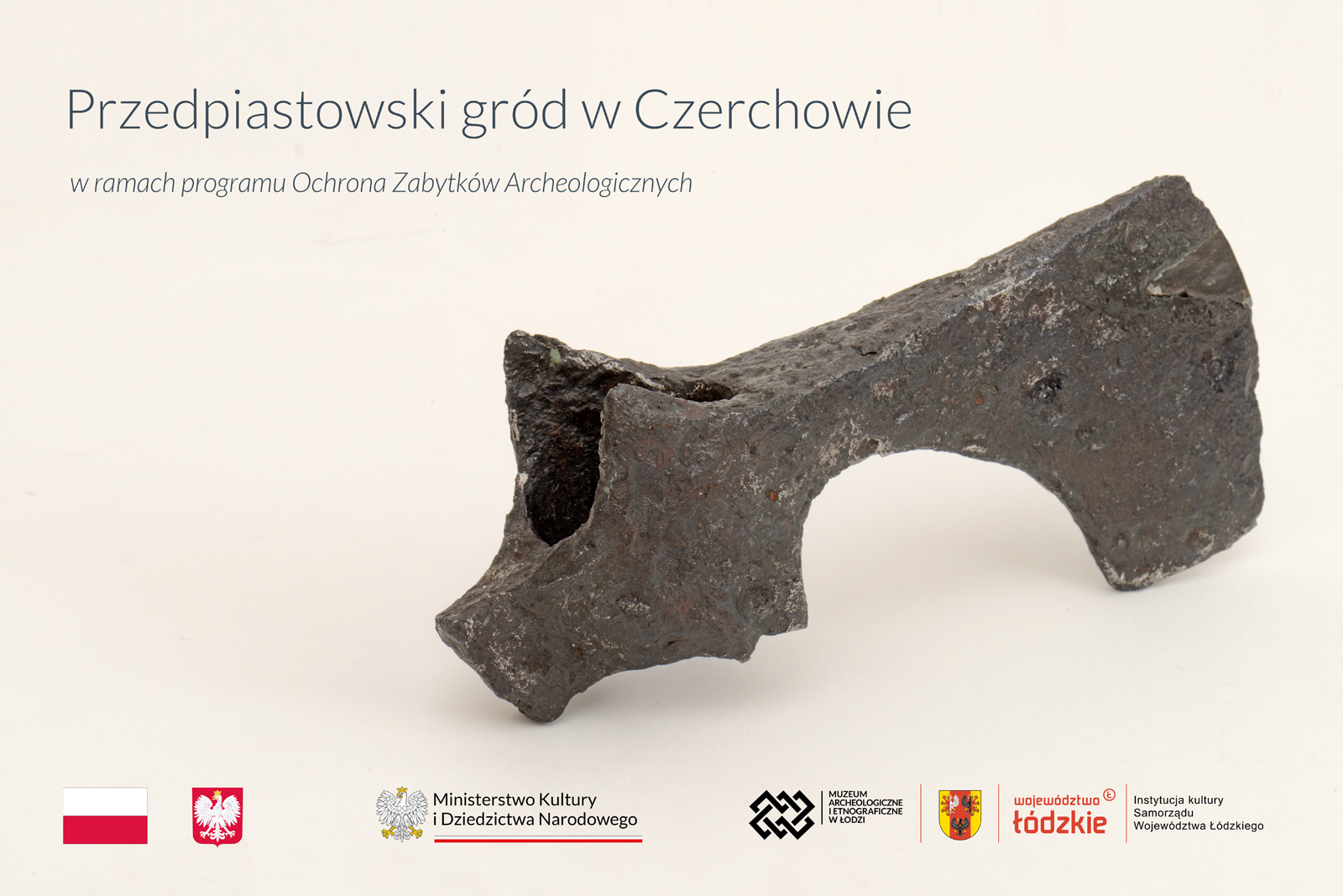 grafika przedstawiająca metalowy czekan - zabytek archeologiczny oraz tytuł projektu
